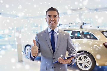 Image showing happy man at auto show or car salon