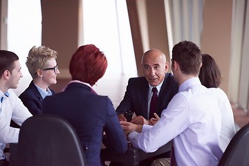 Image showing business people group on meeting at modern bright office