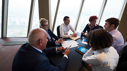 Image showing business people group on meeting at modern bright office