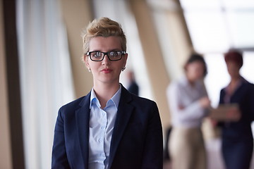 Image showing business people group, woman in front  as team leader