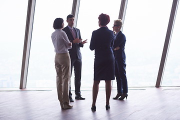 Image showing business people group on meeting at modern bright office