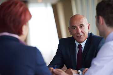 Image showing business people group on meeting at modern bright office