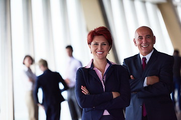 Image showing diverse business people group with redhair  woman in front