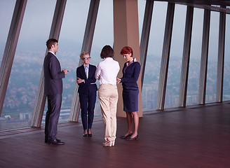 Image showing business people group on meeting at modern bright office