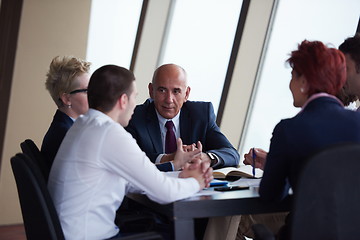 Image showing business people group on meeting at modern bright office