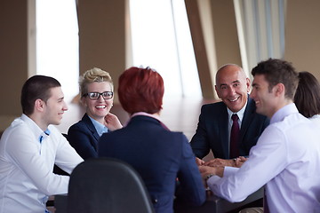 Image showing business people group on meeting at modern bright office