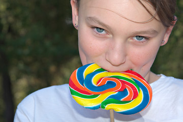 Image showing teenager with lollipop