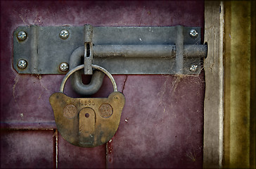 Image showing old locked door