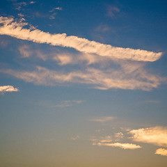 Image showing in the red blue sky cloud and sunrise orange color