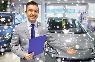 Image showing happy man at auto show or car salon