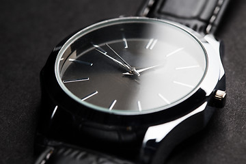 Image showing close up of black classic male wristwatch