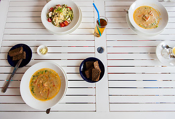 Image showing close up of pasta with tomato and cheese on plate