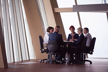 Image showing business people group on meeting at modern bright office