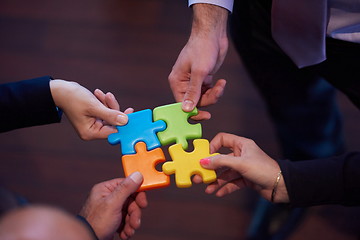 Image showing assembling jigsaw puzzle