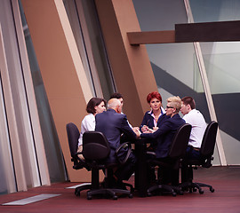 Image showing business people group on meeting at modern bright office