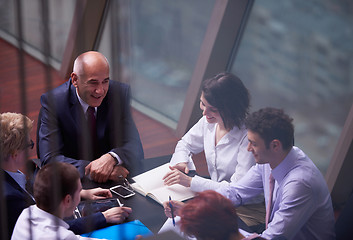 Image showing business people group on meeting at modern bright office