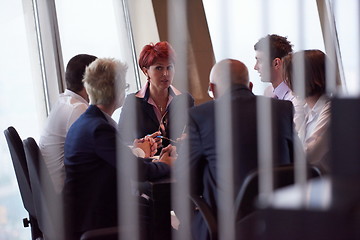 Image showing business people group on meeting at modern bright office