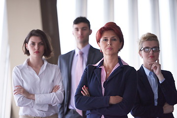 Image showing diverse business people group with redhair  woman in front