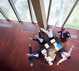 Image showing top view of business people group throwing dociments in air