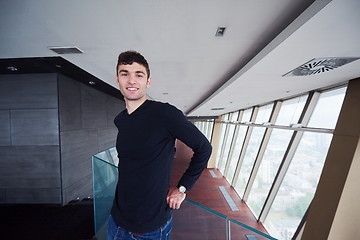 Image showing young successful man in penthouse apartment