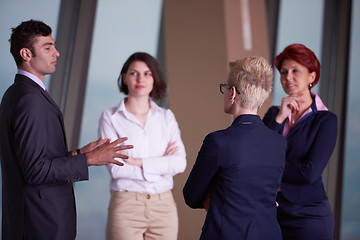 Image showing business people group on meeting at modern bright office