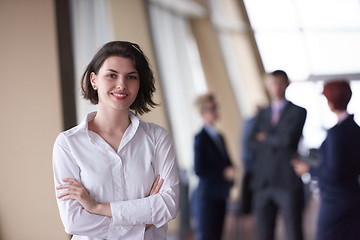 Image showing business people group, woman in front  as team leader