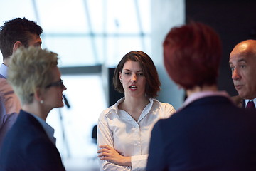 Image showing business people group on meeting at modern bright office