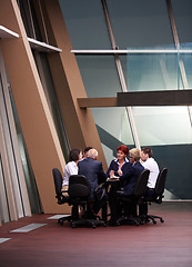 Image showing business people group on meeting at modern bright office