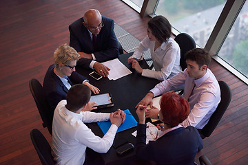 Image showing business people group on meeting at modern bright office