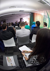 Image showing taking notes on business conference