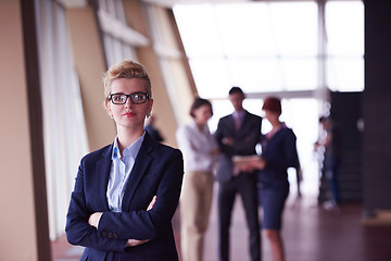 Image showing business people group, woman in front  as team leader