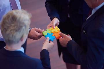 Image showing assembling jigsaw puzzle