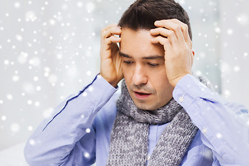 Image showing close up of ill man with flu and headache at home