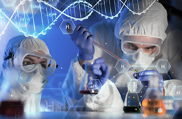 Image showing close up of scientists making test in lab