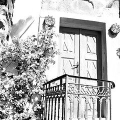 Image showing blue door in antique village santorini greece europe and    whit