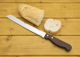 Image showing Portion of baguette with a slice cut off