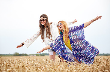 Image showing happy hippie women having fun on cereal field