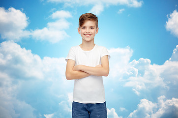 Image showing happy boy in white t-shirt and jeans