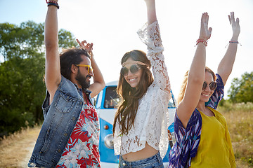 Image showing happy young hippie friends dancing outdoors