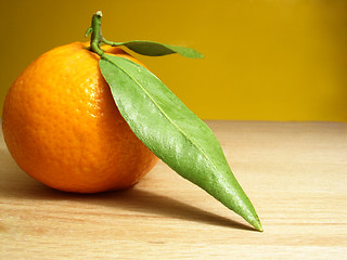 Image showing tangerines and leaf