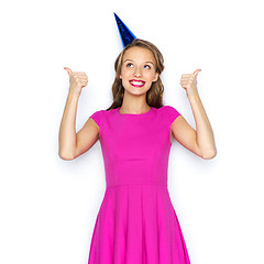 Image showing happy young woman or teen girl in party cap