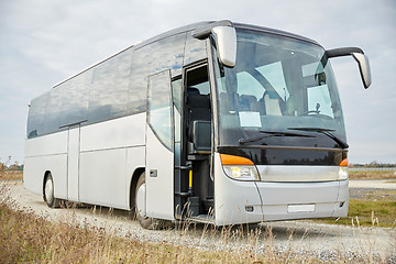 Image showing tour bus staying outdoors