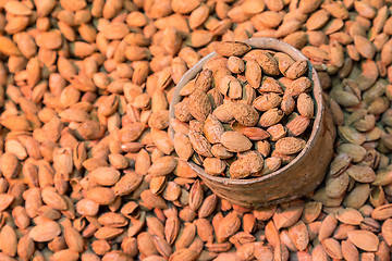 Image showing Scoop of almonds.