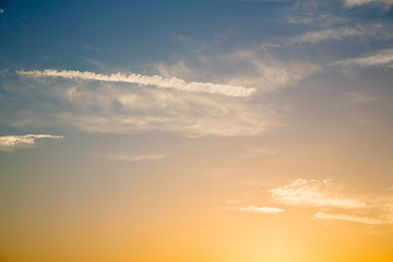 Image showing in the red blue sky cloud and  orange color