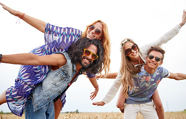 Image showing happy hippie friends having fun on cereal field