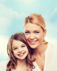 Image showing smiling mother and little girl