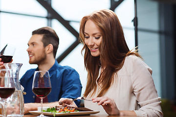 Image showing happy couple having dinner at restaurant