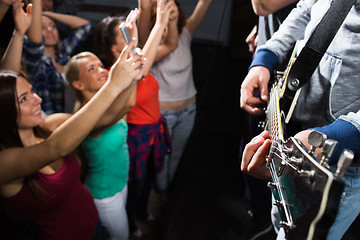 Image showing close up of people at music concert in night club