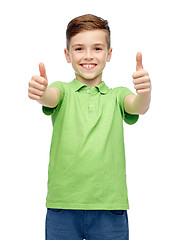 Image showing happy boy in green polo t-shirt showing thumbs up