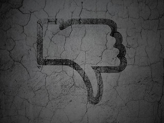 Image showing Social network concept: Thumb Down on grunge wall background